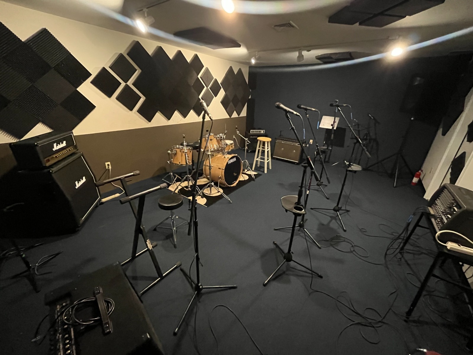 Actual HomeFront 2.0 full rehearsal room with Yamaha drum kit and Marshall amplifiers